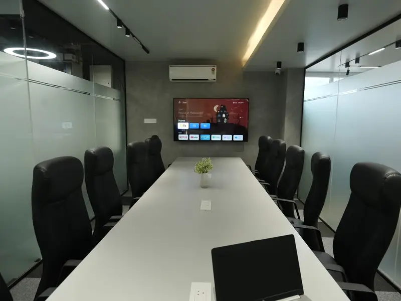 Long boardroom view at Spunic Kondotty coworking